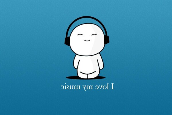 الرجل الصغير يستمع إلى الموسيقى مع سماعات الرأس