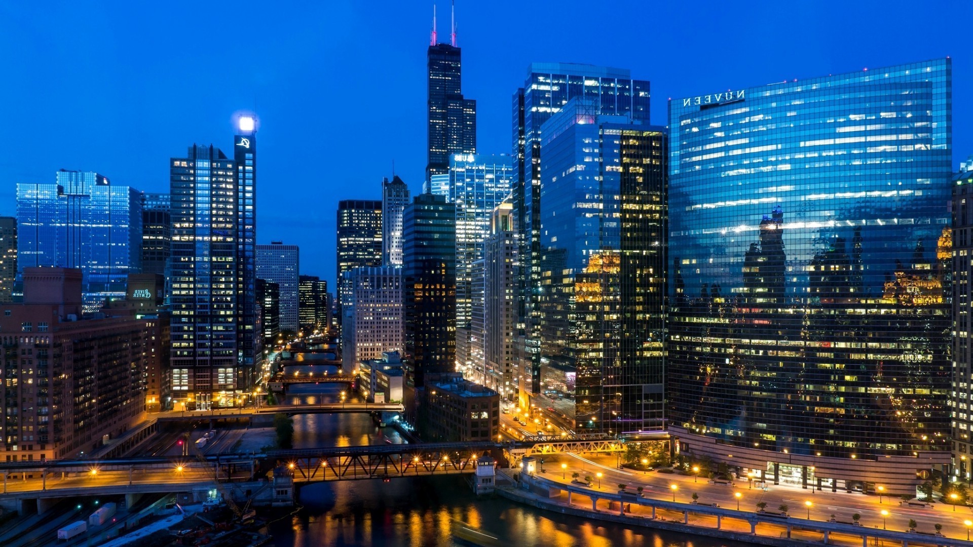 ناطحة سحاب المدينة وسط المدينة المدينة العمارة الشفق الأفق المنزل المكتب مضيئة الأعمال التجارية المرور السفر الحديث المساء البرج السماء الحضرية المالية